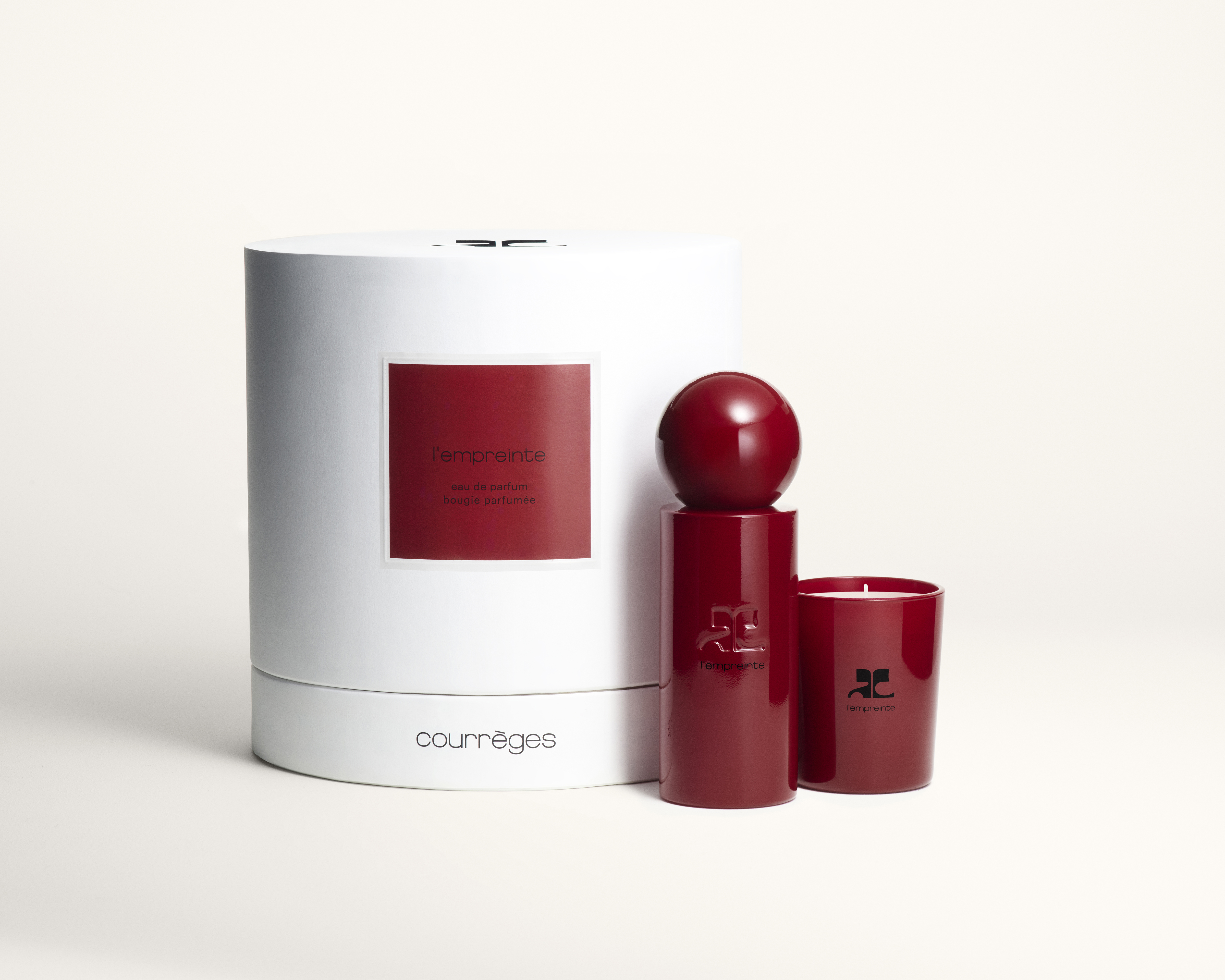 Courrèges L'Empreinte Set = E.d.P. Nat. Spray 100 ml + Duftkerze 75 g