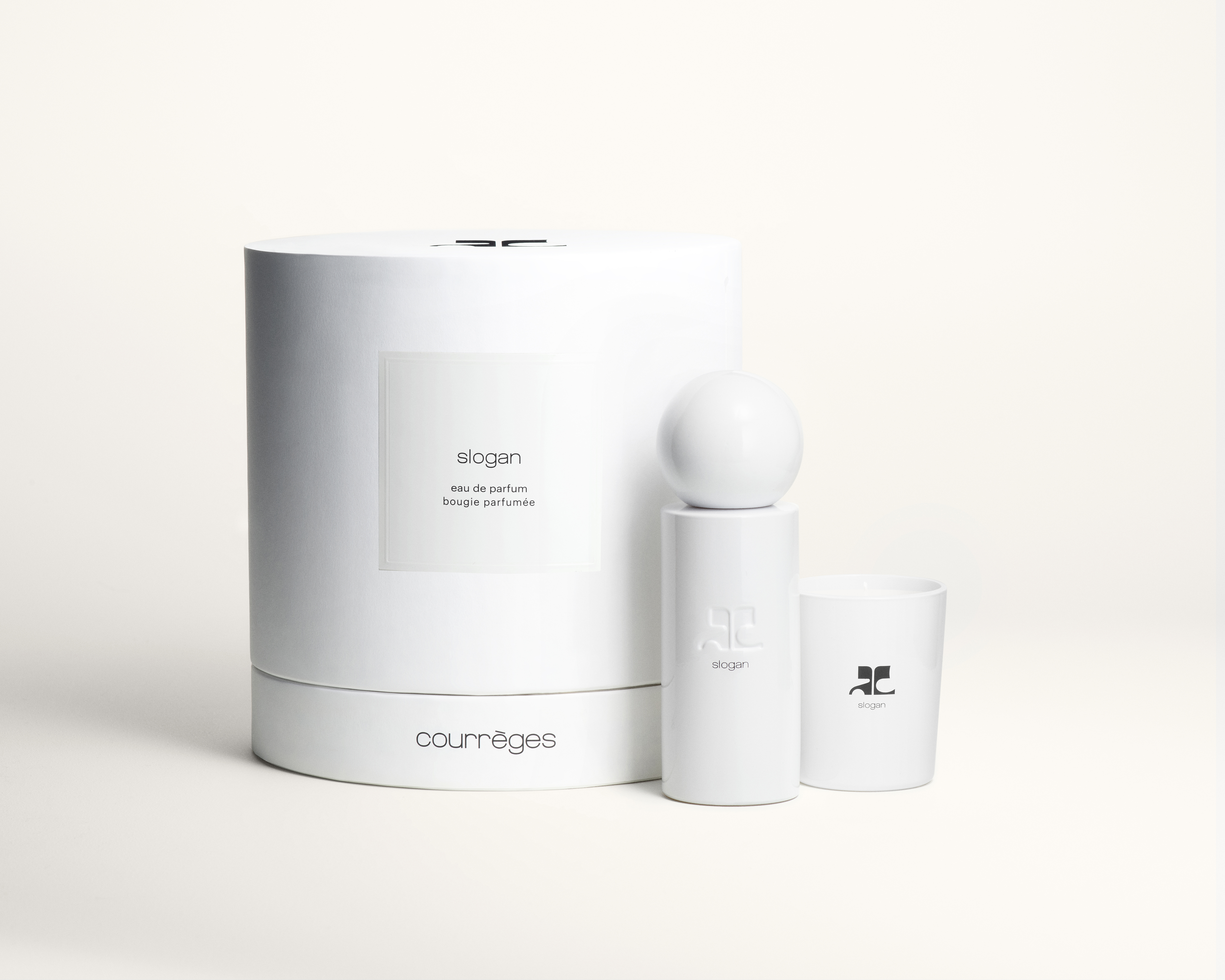 Courrèges Slogan Set = E.d.P. Nat. Spray 100 ml + Duftkerze 75 g